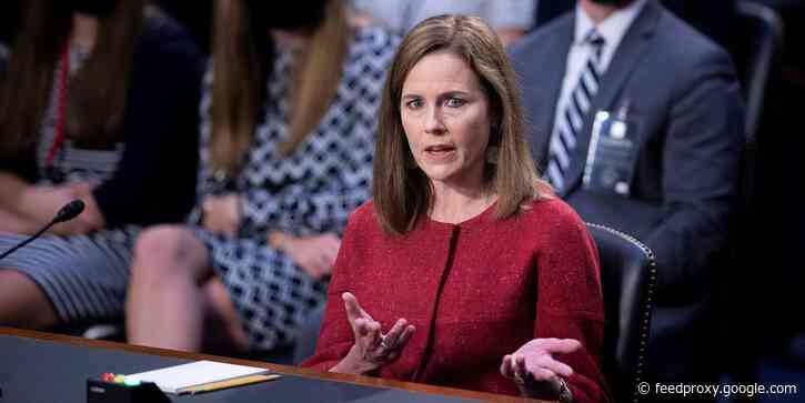 Amy Coney Barrett apologizes after being called out by a Democratic senator for using the 'offensive and outdated' term 'sexual preference' to refer to LGBTQ people