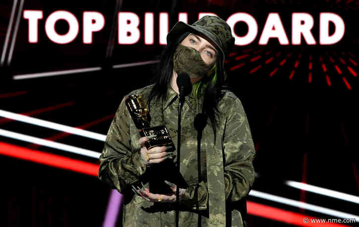 Billie Eilish urges fans to “please vote and wear a mask” while accepting Billboard Music award
