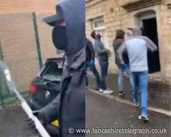 Terror on quiet Church street as masked gang descend