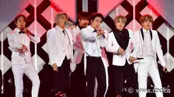 Shares for company behind South Korea's hit band BTS soar on Thursday amid COVID-19 pandemic