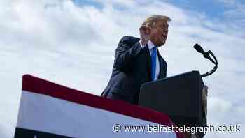 Trump takes swipe at disease expert Fauci over mask guidance