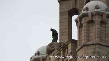 Batman stunt double spotted on top of Liverpool’s Royal Liver Building