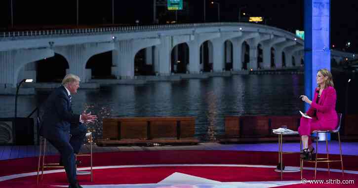 Trump, Biden go at it — from a distance — in town halls