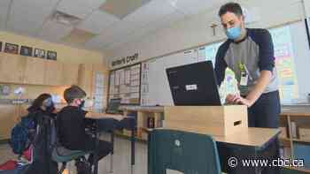 As school boards blend in-person and virtual classes, criticism emerges for hybrid model