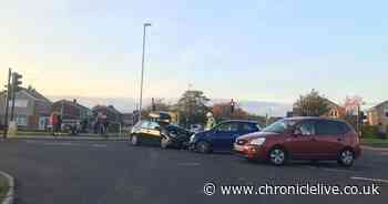 Two cars crash in head-on collision at crossroads near golf club