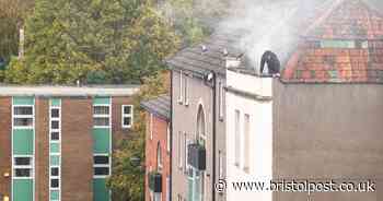 Man in burning building 'climbed out of window on to roof'