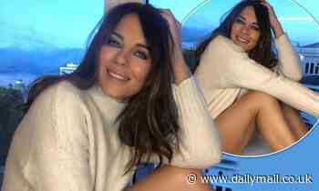 Elizabeth Hurley, 55, puts on a VERY leggy display in just a cream jumper