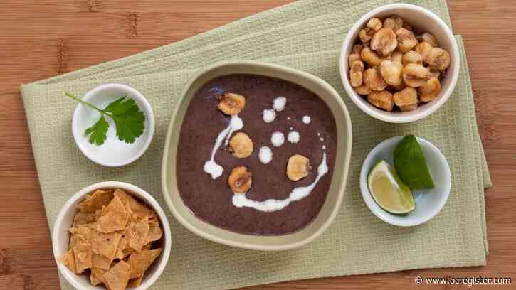 Recipe: This black bean soup with crunchy garnishes makes some noise