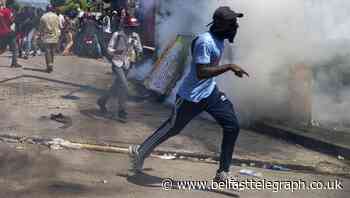 Police in Haiti use tear gas and rubber bullets to disperse protesters