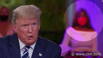 The mystery of the nodding woman at Trump town hall