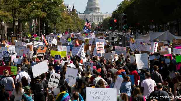 Women's march rallies outside White House urging voters to reject Trump
