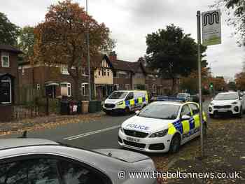 Police remain on scene after 'violent disturbance' in Breightmet which left two men injured