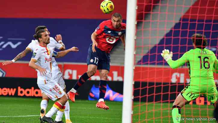 Lille go top of French league after routing 9-man Lens in northern derby