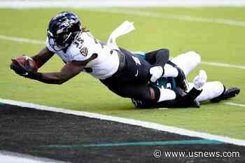 Ravens Hold on for 30-28 Win Over Depleted Eagles