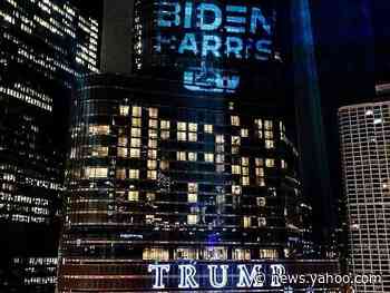 National steelworkers union shines &#39;Biden Harris&#39; sign on Trump Tower in Chicago