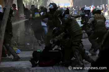 Chile Anniversary Rallies Turn Violent as Churches Burned, Police Fire Tear Gas