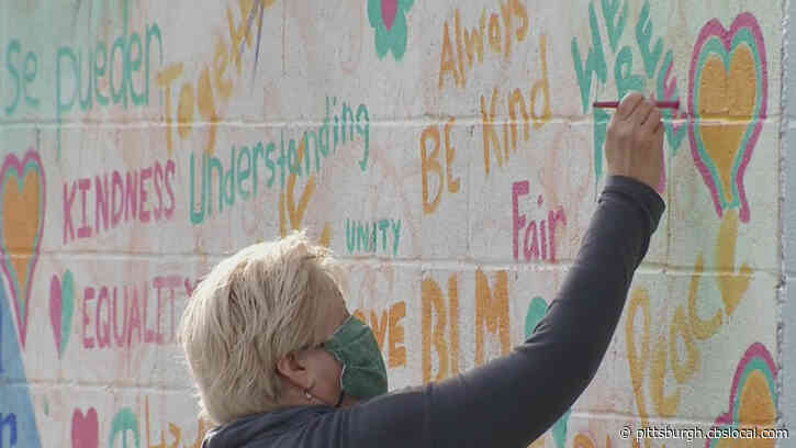 Artists Paint Mural Aimed At Raising Awareness For Gun Violence, Racism
