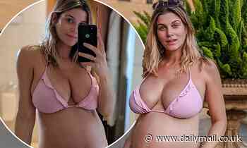 Pregnant Ashley James wears pink frill bikini during Cyprus trip