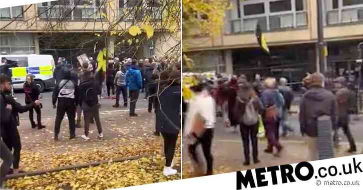 Officer punched as 200 anti-lockdown protesters clash with police in Leeds