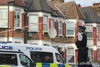 Police in stand-off with man who climbed onto roof in &#39;after assaulting officer&#39; in Tottenham