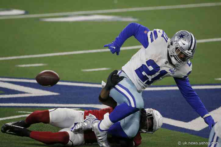 Elliott fumbles pair, Cowboys stumble in 38-10 loss to Cards