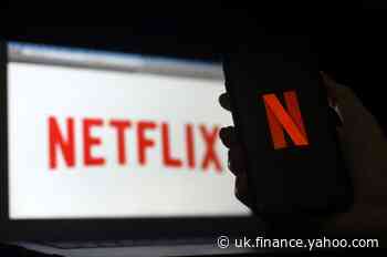 Netflix reports slowing subscriber growth; shares slide