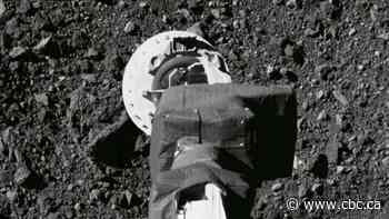 U.S. spacecraft touches asteroid to grab sample