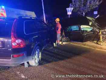 Three people taken to hospital after two-car crash