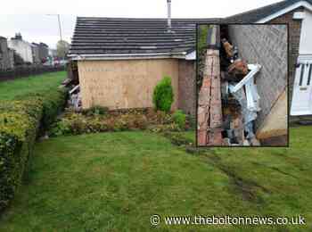 Two arrested after car smashes into bedroom in Bromley Cross