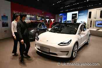 Tesla profit doubles as car deliveries surge