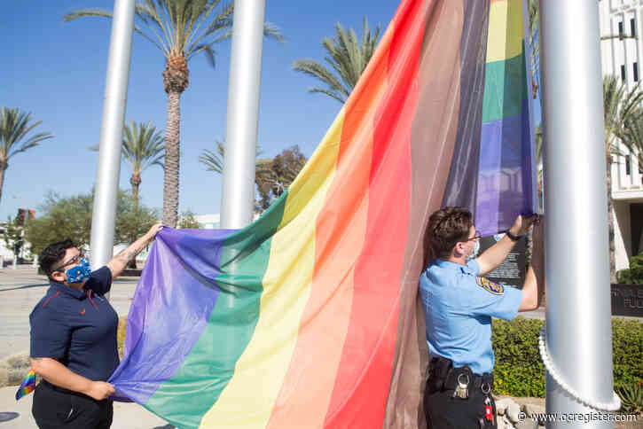 Cal State Fullerton raises the flag to support National Coming Out Day