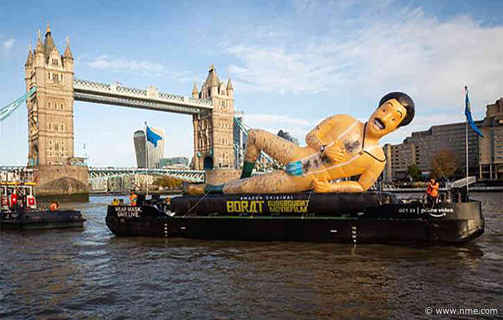 A 40-foot inflatable Borat statue floated down the River Thames today