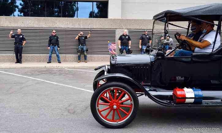Classic cars cruise through Orange to thank frontline workers