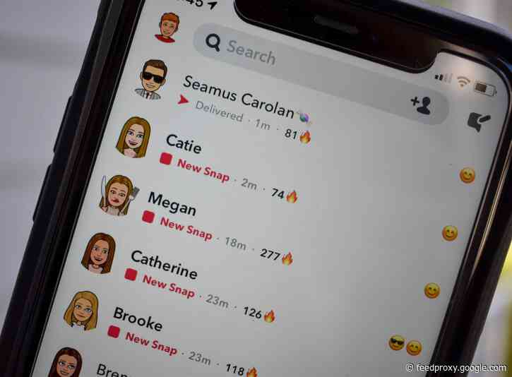 How to tag someone on Snapchat using the @mention feature, and link them to your photos