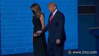 Melania Appears to Pull Hand Away from President Trump After Debate
