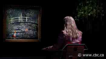 Banksy painting sells for nearly $10M US at auction