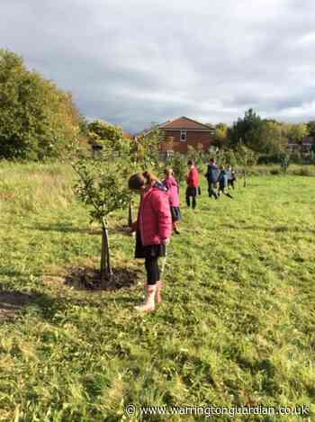Children ready for spring with bulb planting day
