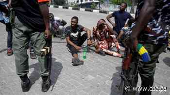 Nigeria says dozens dead in unrest over police brutality