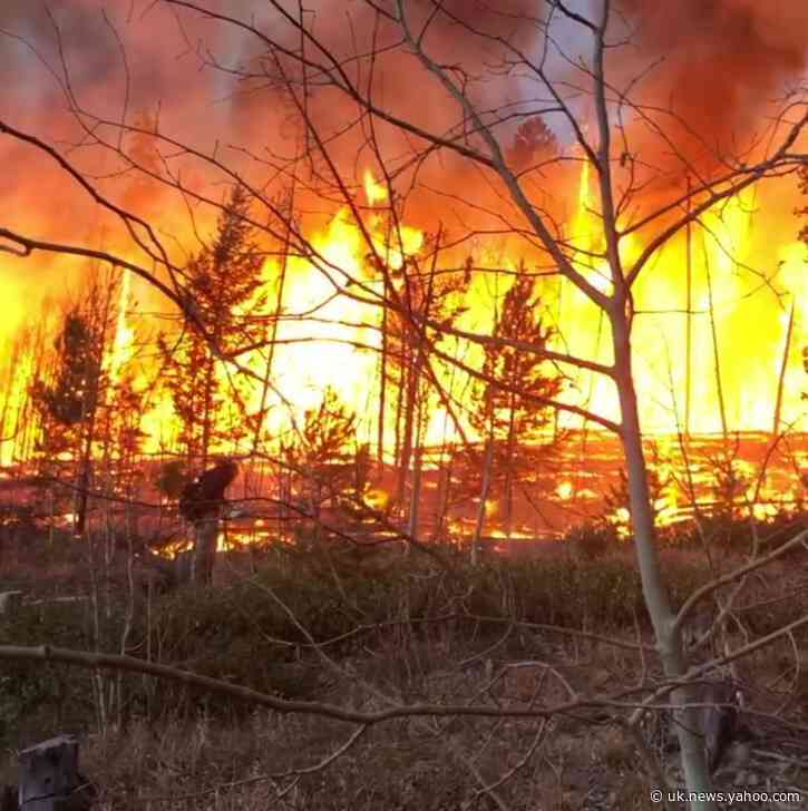 Crews battling largest wildfires in Colorado history brace for high winds