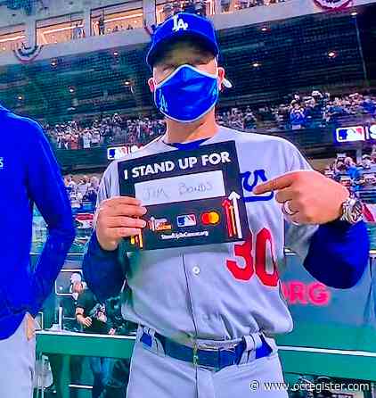 Dodgers’ Dave Roberts salutes St. Francis football coach during “Stand Up To Cancer” campaign