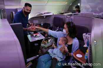 Travel-starved 'passengers' dine on parked Singapore Airlines jet
