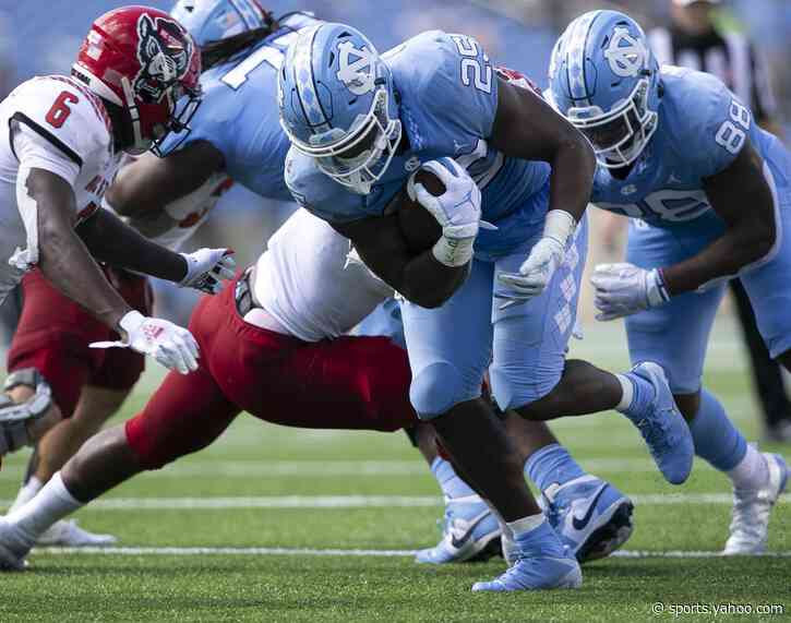 Williams, Carter lead No. 14 UNC past No. 23 NC State 48-21