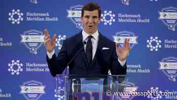 Watch Eli Manning do push ups with adorable son Charlie on his back while watching Ole Miss football