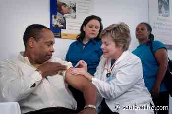 Michigan health care workers get first access to COVID-19 vaccine