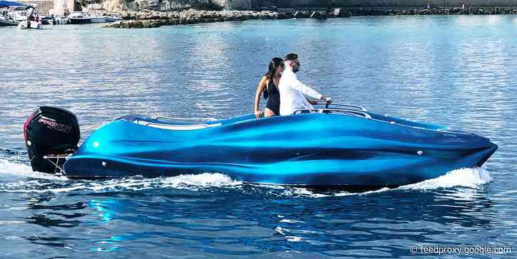 An Italian company created the world's first 3D-printed fiberglass boat — take a closer look at the sleek 'Mambo'