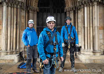 PICTURES: Daring abseilers take a close look at the Minster
