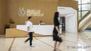 Ant Group sets new IPO record with $34 billion share sale