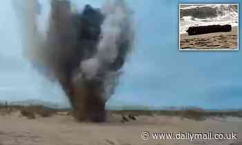 Moment WWII-era bomb that washed up on North Carolina beach is detonated by US Navy