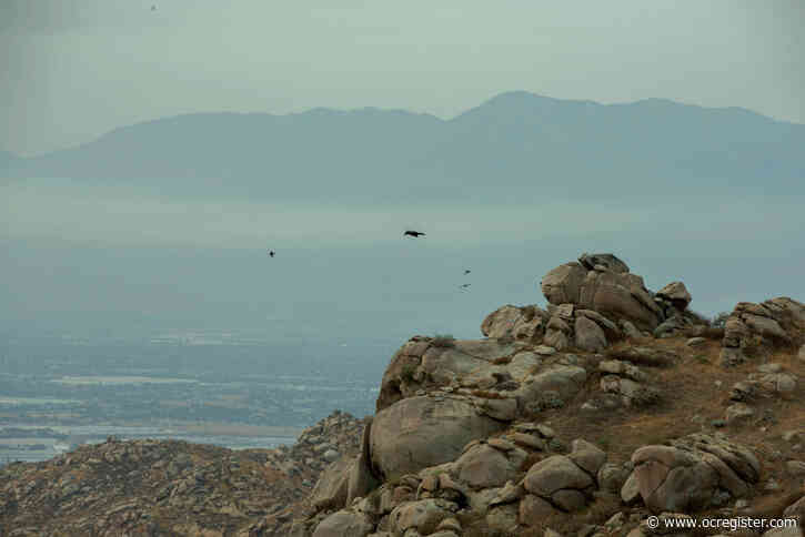 Strong Santa Ana winds stir up smoke, ash from El Dorado and Bobcat fires
