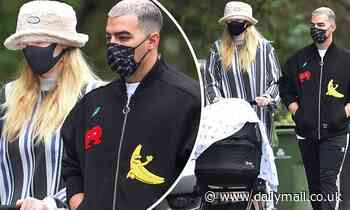 Sophie Turner and Joe Jonas take their newborn daughter Willa out for an afternoon stroll - Daily Mail
